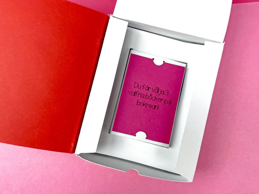 Presentask som ser ut som en bok