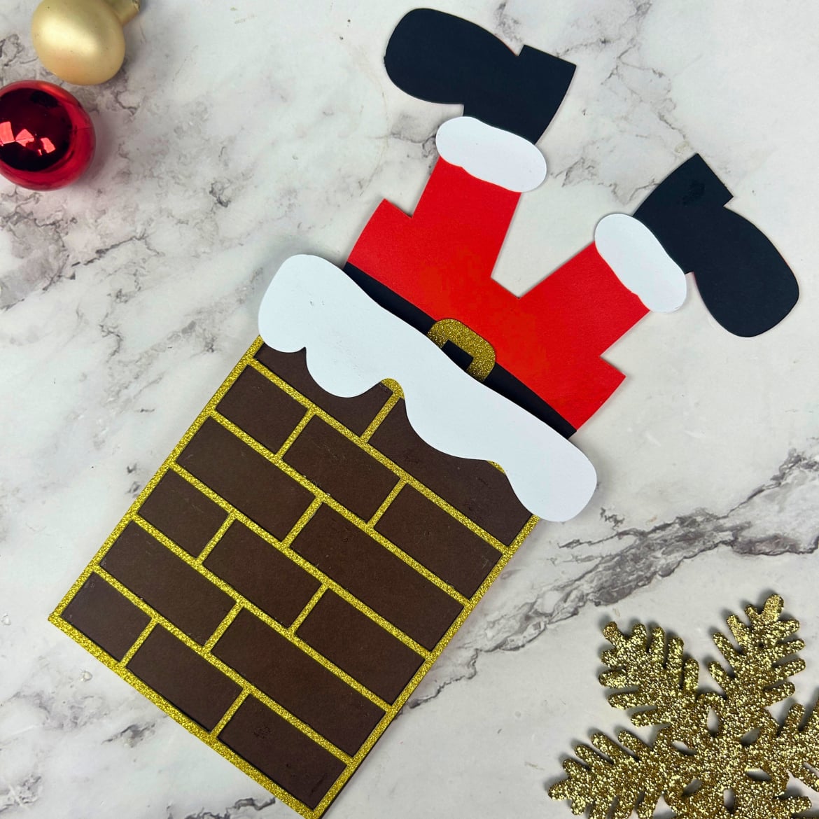 Presentkortshållare tomte i skorstenen